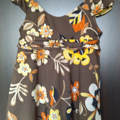 Please top like new, women's with adjustable ties, colorful