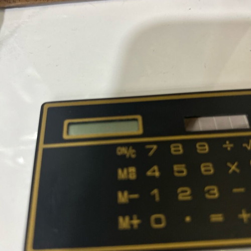 Ultra Thin Calculator with Touchscreen and Solar Power, Like New