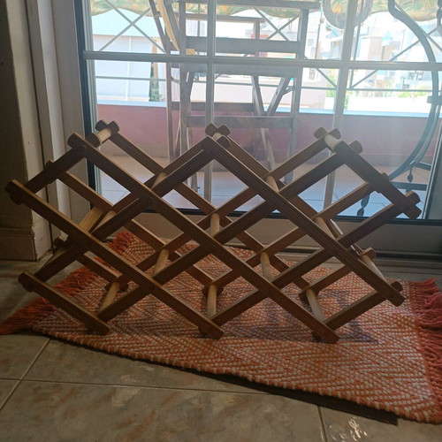 Reclining wooden wine rack used
