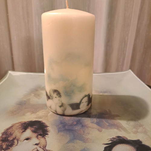 Plate with angels and used candle