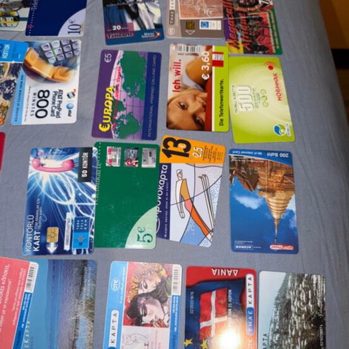 Phone cards and time cards used, collection of 29 from various countries