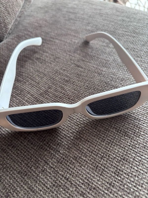 Sunglasses used with beige frame