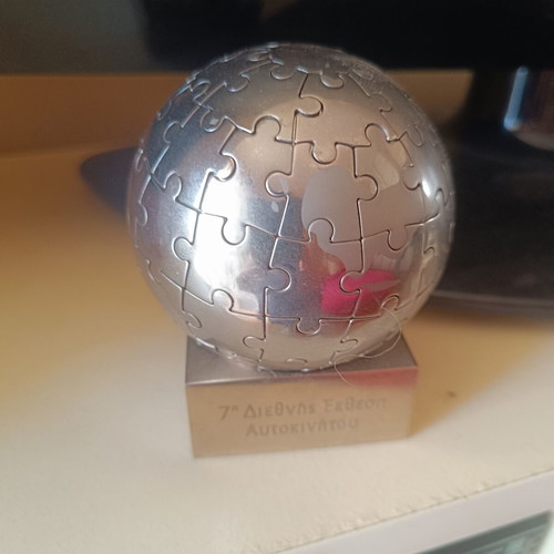 Decorative puzzle globe from international car exhibition, used
