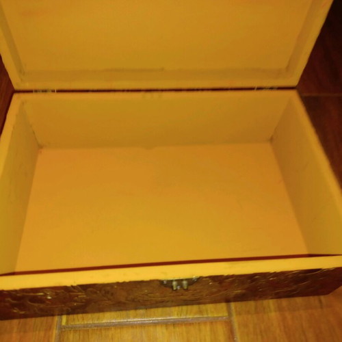 Wooden antique box used with embossed bronze decorations