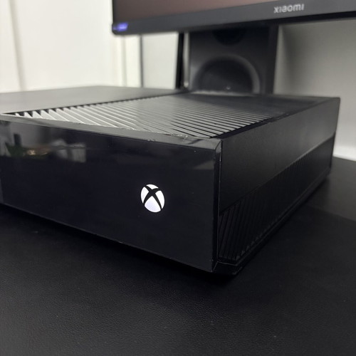 Xbox One 1TB console used with controller and 2 games