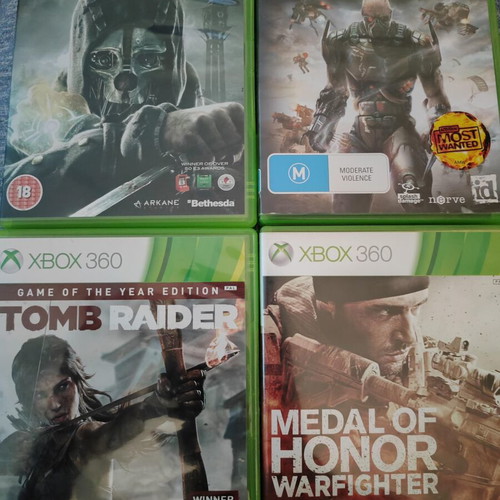 Xbox 360 game pack used with Tomb Raider Medal of Honor Quake Wars Dishonored