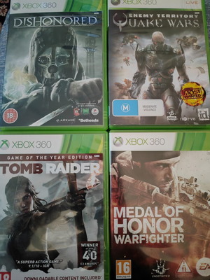 Xbox 360 game pack used with Tomb Raider Medal of Honor Quake Wars Dishonored