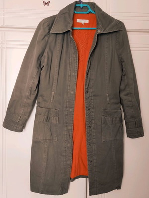 Khaki trench coat in unique style like new, size M