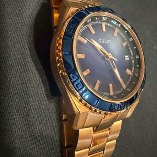 Guess W0469L2 watch used, stainless steel rose gold, blue dial 36mm