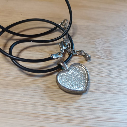 Necklace with silver heart and blue rhinestones