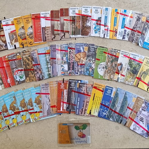 Phone cards pack of 128 sealed, all different