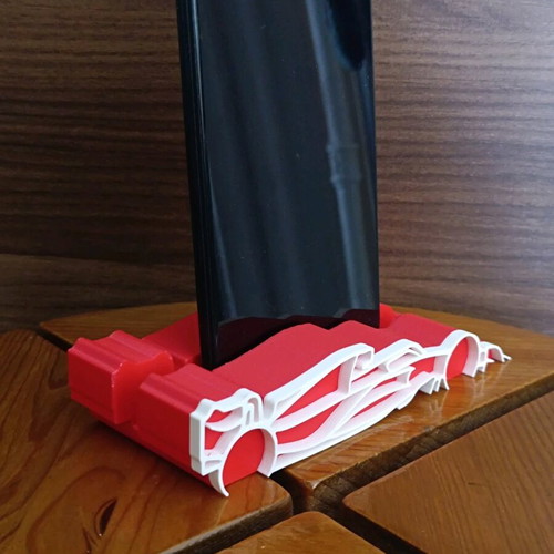 F1 phone stand new, plastic, red and white