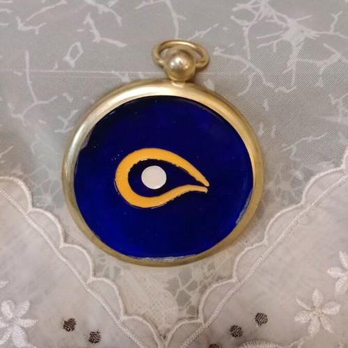 Vintage glass eye like new with ring and stainless metal