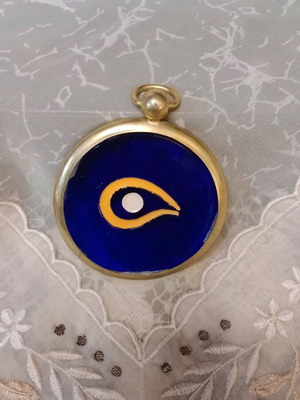 Vintage glass eye like new with ring and stainless metal