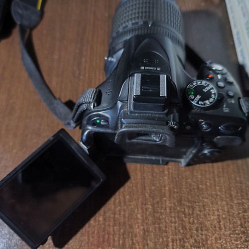 Nikon D5200 DSLR with Nikkor 35mm f/1.8G lens and accessories