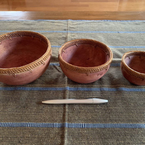 Set of three small handmade bowls in wood and rattan like new