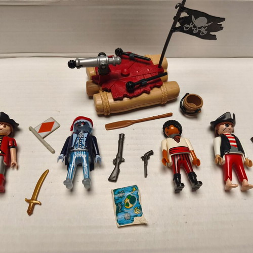 Playmobil pirates set used with 4 figures and functional cannon