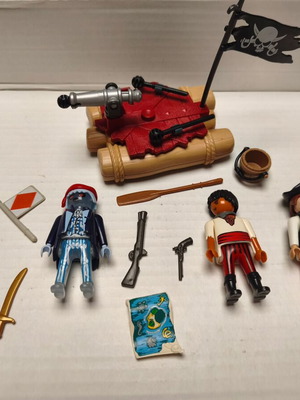 Playmobil pirates set used with 4 figures and functional cannon
