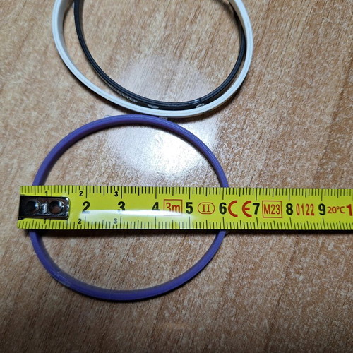 Rubber bracelets like new, set of 3, white and purple