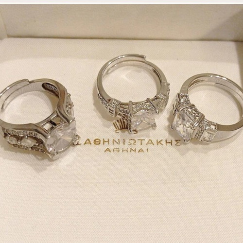 Galerie Tsangarakis rings with white sapphires like new, plated silver