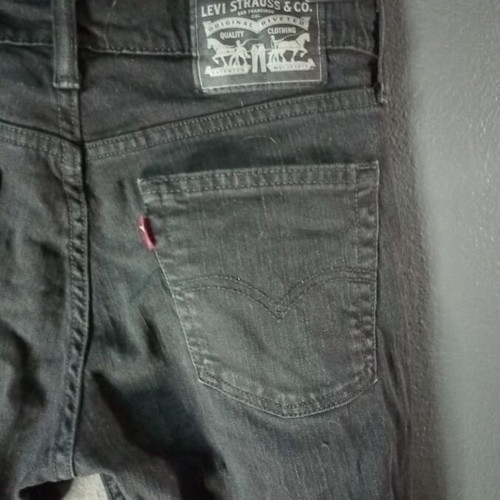 Levi Strauss & Co black jean with rips, size S, like new