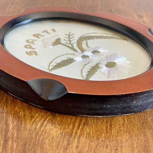 Wooden embroidered plaque used with Sparta theme