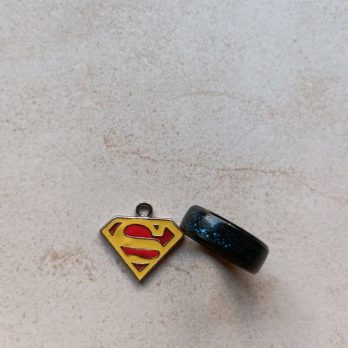 Ring and Superman pendant like new, no chain
