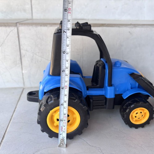 Plastic bulldozer toy used, blue and yellow