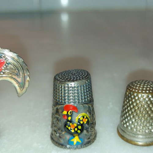 Collection of used thimbles over 40 years old