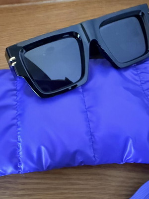 Polar black sunglasses with case and cleaning cloth