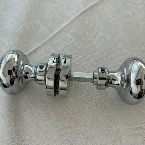 Door knobs used, 9 sets, chrome ball type with rosette