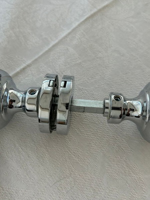 Door knobs used, 9 sets, chrome ball type with rosette