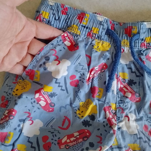 Boys' swim shorts used, size 110-116, blue with car print