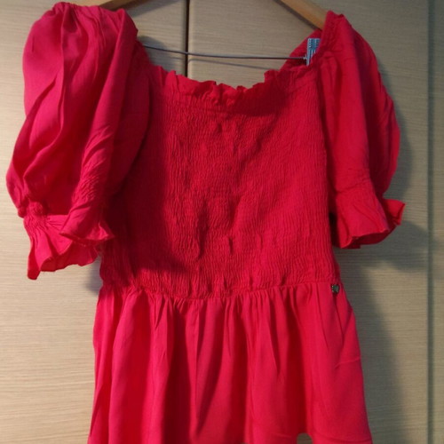 Regalinas fuchsia blouse with smocking like new