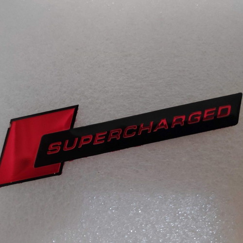 Supercharged Aluminum Badge like new
