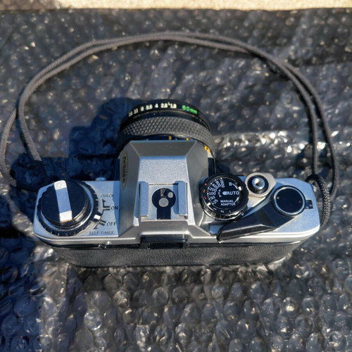 Olympus OM-10 film camera with Zuiko 50mm f/1.8 lens