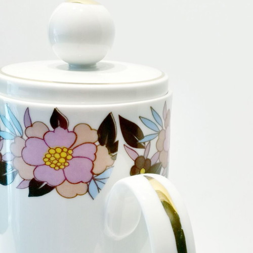Vintage seventies porcelain teapot used with geometric design