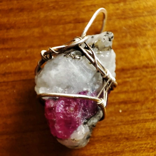 Ruby uncut semiprecious stone like new, bound with steel