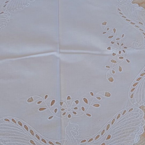 Embroidered square table linen with machine embroidery