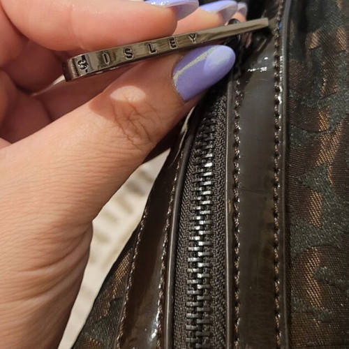 Sisley shoulder bag like new, brown with embossed letters and patent details