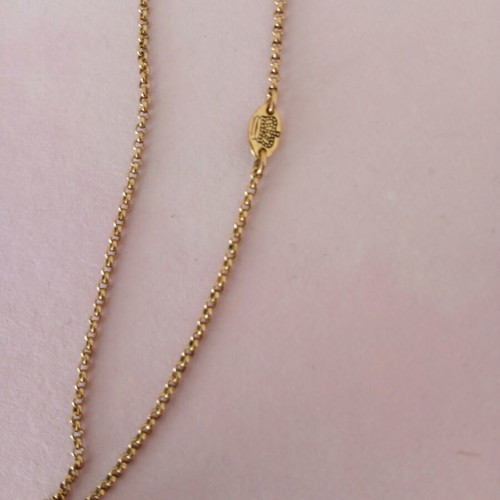 Juicy Couture necklace used with pearl and brand name