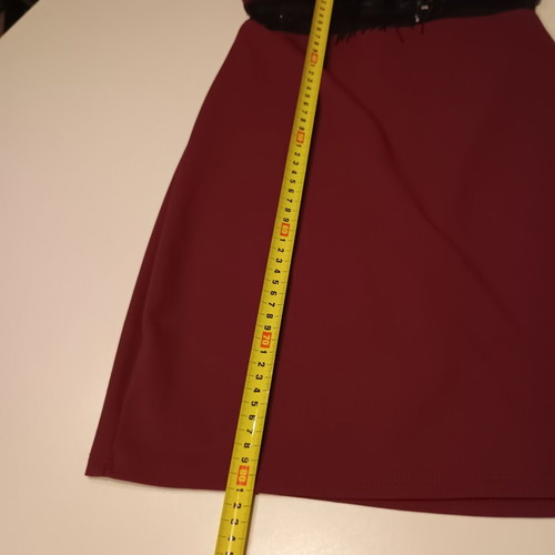 Midi dress for special occasions like new, burgundy with lace and fringes
