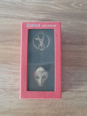 Mask keychain new with wear marks