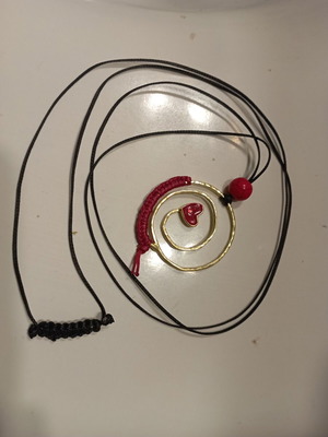 Heart pendant new brass with black cord