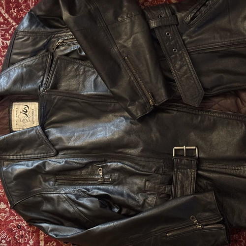 Leather jacket new with matching belt, unisex, black