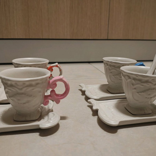 Porcelain glasses used, one slightly broken