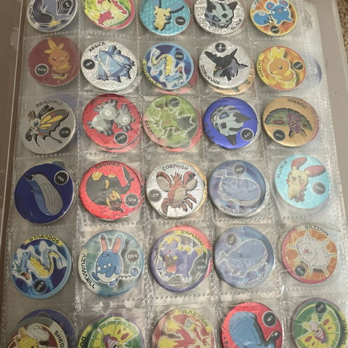 Pokemon tazos with album collection