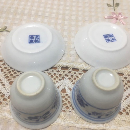 Cups without handles in bowl style with saucers, new