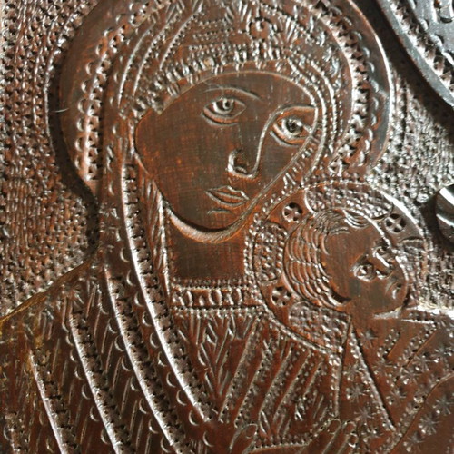 Wooden carved icon of Virgin Mary with baby Jesus
