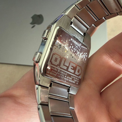 Fossil OLED JR-9465 watch like new, unisex, silver metal band